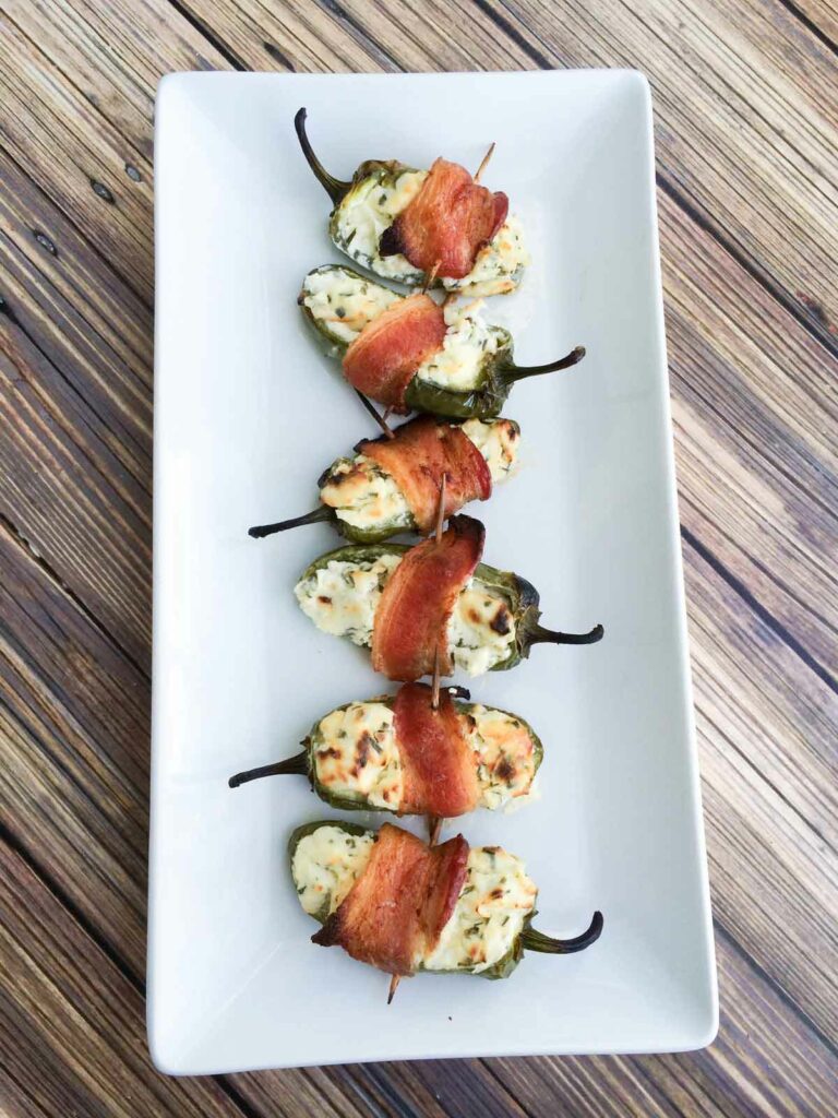 Jalapeno Poppers with Bacon on a white platter