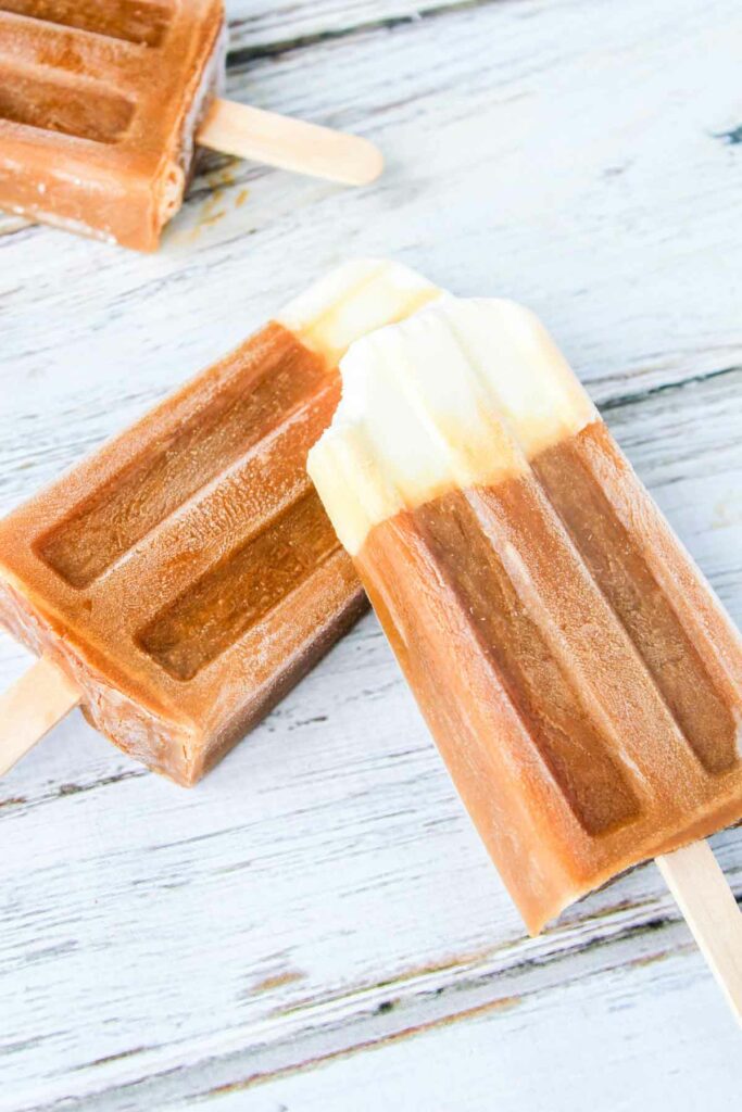 root beer float popsicles with a bite taken out