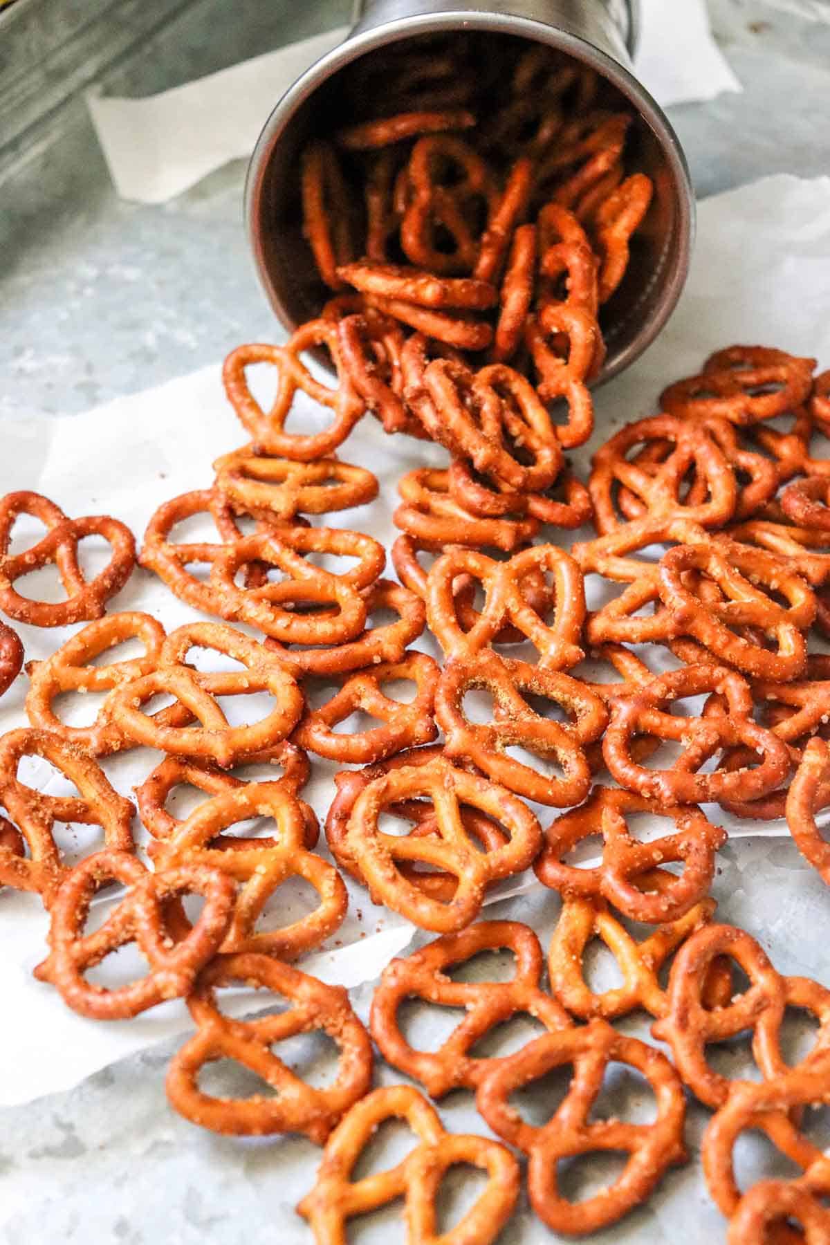 Air Fryer Garlic and Onion Pretzels spilling out of a cup